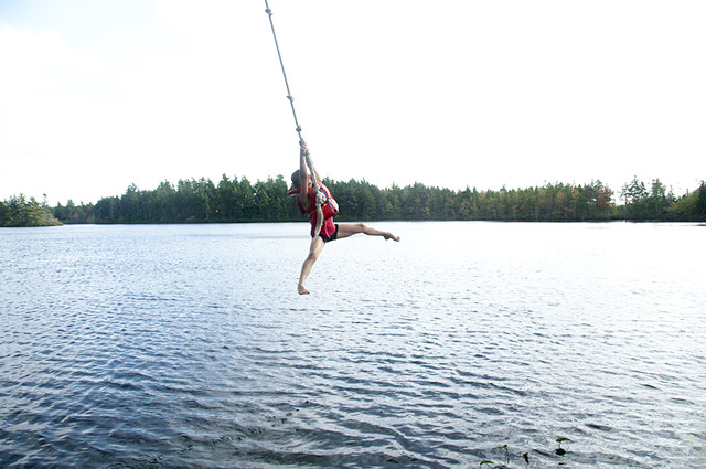 Rope swing over Nova Scotia lake
