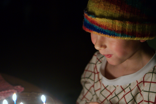 is this kid excited to eat this cake or what