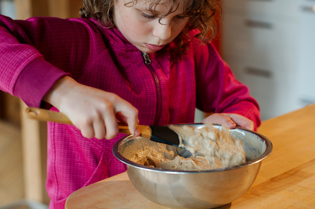 girl stirring batter