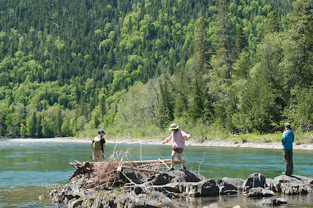 kids playing at river