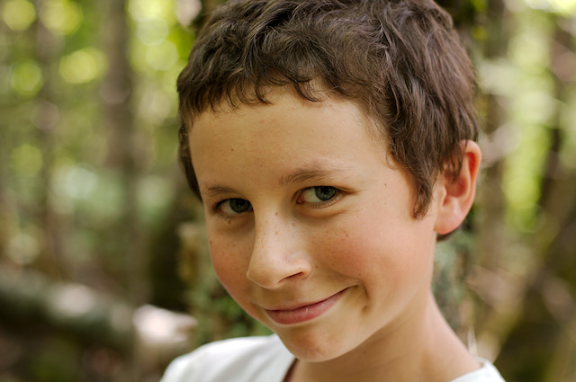 Change Of Emotions Of Child. Portrait Of Boy Smiling And 
