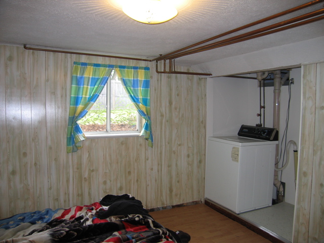 Basement bedroom laundry after