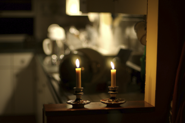 doing dishes by candlelight