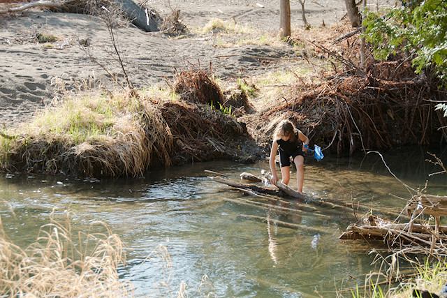 girl in water with net