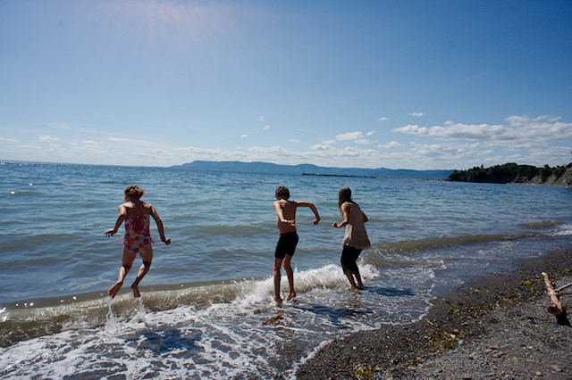 kids jumping water