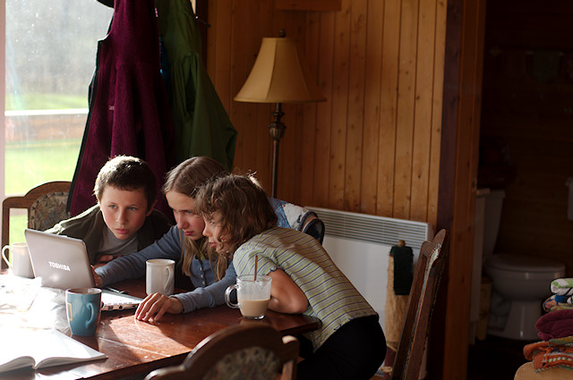 kids on computer at table