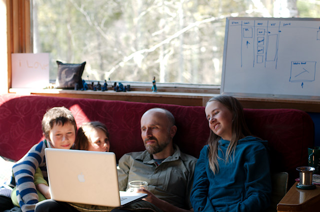 kids with dad on computer