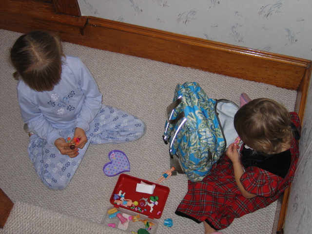 Girls playing with new pollys