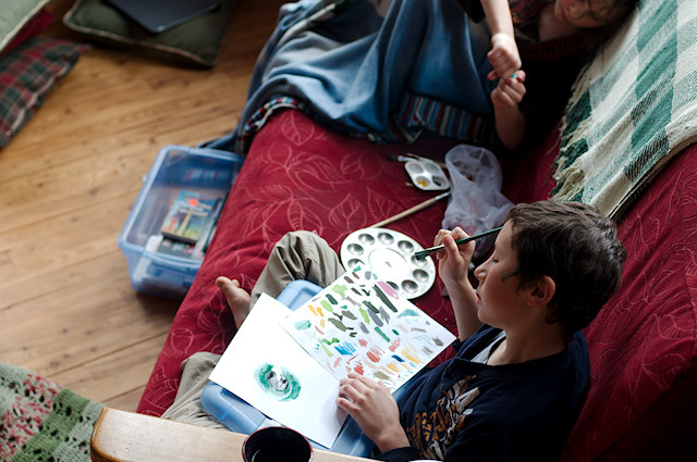 kids painting on couch