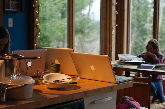 three computers on counter